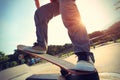 Skateboarder legs riding skateboard Royalty Free Stock Photo