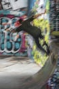 Skateboarder making flip-tricks on his skateboard