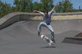 Skateboarder performing a kickflip Royalty Free Stock Photo