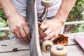 Skateboarder prepares a board for driving in a home workshop Royalty Free Stock Photo