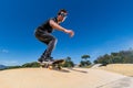 Skateboarder on a pump track park Royalty Free Stock Photo