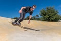 Skateboarder on a pump track park Royalty Free Stock Photo