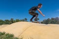 Skateboarder on a pump track park Royalty Free Stock Photo