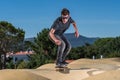 Skateboarder on a pump track park Royalty Free Stock Photo