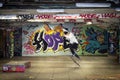 Skateboarder silhouette in a public skate park of London placed in Southbank area slow shutter image