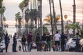 Skateboarders near Venice Beach at sunset