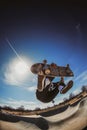 Skateboarding Youth in mid air