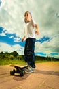 Skater boy child with his skateboard. Outdoor activity. Royalty Free Stock Photo