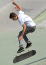 Skater boy performs during contest at Street Heroes urban festival