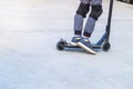 Skater boy practicing at the skate park on a sunny summer day. Active urban life. Urban subculture. Royalty Free Stock Photo