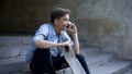 Skater boy talking on phone, arranging meeting of skateboarders, youth hobby