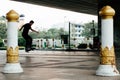 Skater boy under Rama 8 Bridge Bangkok