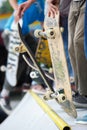 Group of skater boys compete in skate contest outdoor