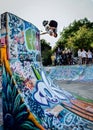 Skater going high on vert wall