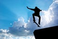 Skater jump silhouette and blue sky