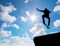 Skater jump silhouette and blue sky