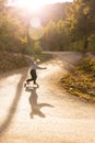 Skater long boarder speed skater magic hour