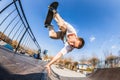 Skater make handplant in mini ramp in skatepark Royalty Free Stock Photo