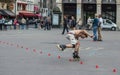 Skater maneuvers through cones on the Place du Palais Royal, Par