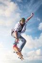 Skater on the sky background Royalty Free Stock Photo