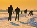 Skaters under setting sun Royalty Free Stock Photo