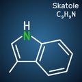Skatole, 3-methylindole molecule. Belong to the indole family. Dark blue background.