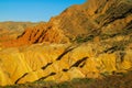 Yellow and red mountain in Asia at rock formation erosion valley Royalty Free Stock Photo