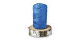 A skein of blue cotton cord, consisting of threads twisted together