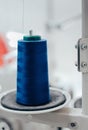 Skein of blue thread on a sewing machine Royalty Free Stock Photo