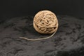 A skein of linen string, cord isolated. Coil of twine. Jute rope. Hemp thread isolated. A skein of brown wool for knitting on a Royalty Free Stock Photo