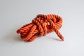 Skein of orange nylon rope on a white background Royalty Free Stock Photo