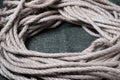 Skein of thick hemp rope on sackcloth. Close-up. Selective focus Royalty Free Stock Photo