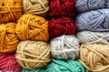 Skeins of colourful yarn arranged in raws