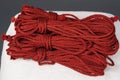 Skeins of red ropes for bondage