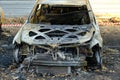 Skeleton of a burnt out car after an accident