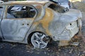 Skeleton of burnt out car.Trunk of a burnt out car