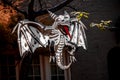 Skeleton Demon Dragon blowup Halloween yard art - hanging from tree - long red tongue - evil Royalty Free Stock Photo