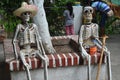 Skeleton figures sitting outdoors in front of the plaza in Puerto Vallarta Mexico