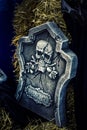 Skeleton on Gravestone Halloween Concept