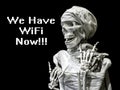 Skeleton model of the man with the inscription we have wifi now. The concept of after death. afterlife of the future.