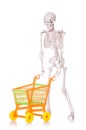 Skeleton with shopping cart trolley isolated