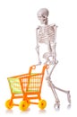 Skeleton with shopping cart trolley isolated