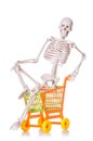 Skeleton with shopping cart trolley isolated