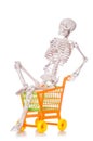 Skeleton with shopping cart trolley isolated