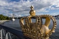 Skeppsholmsbron bridge with golden crown in Stockholm, Sweden