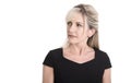 Skeptical face of a elderly attractive blond businesswoman. Royalty Free Stock Photo