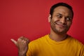 skeptical indian man in yellow t Royalty Free Stock Photo