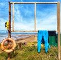 Wetsuit drying in the sun near beach Royalty Free Stock Photo