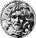 Sketch of architectural detail in form of human face mythological Medusa Gorgon on vintage fence of city garden