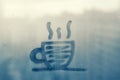 sketch doodling cup of tea or coffee with straw and steam on blue sunset foggy glass windows Royalty Free Stock Photo